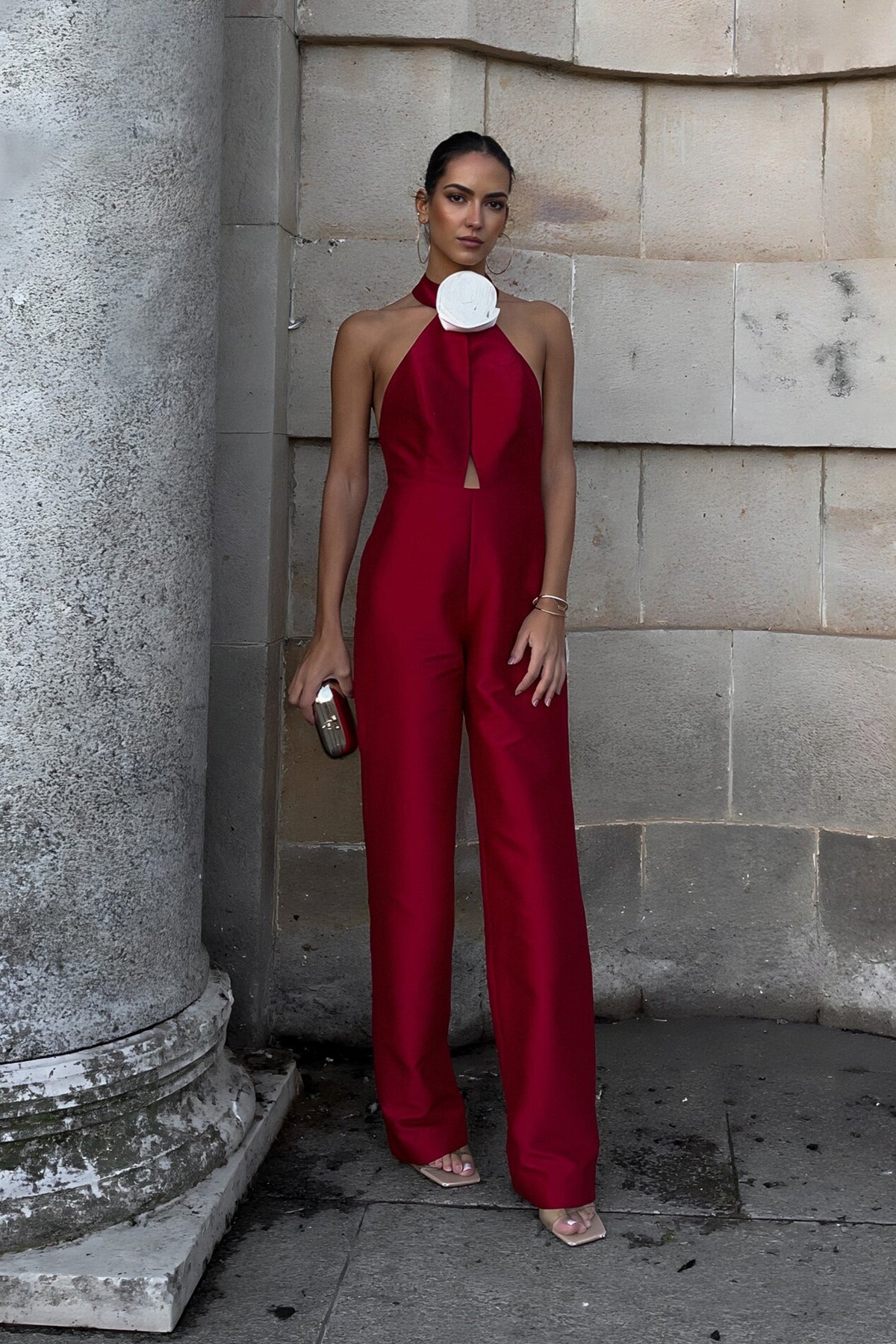 RED STRUCTURED JUMPSUIT WITH FLOWER