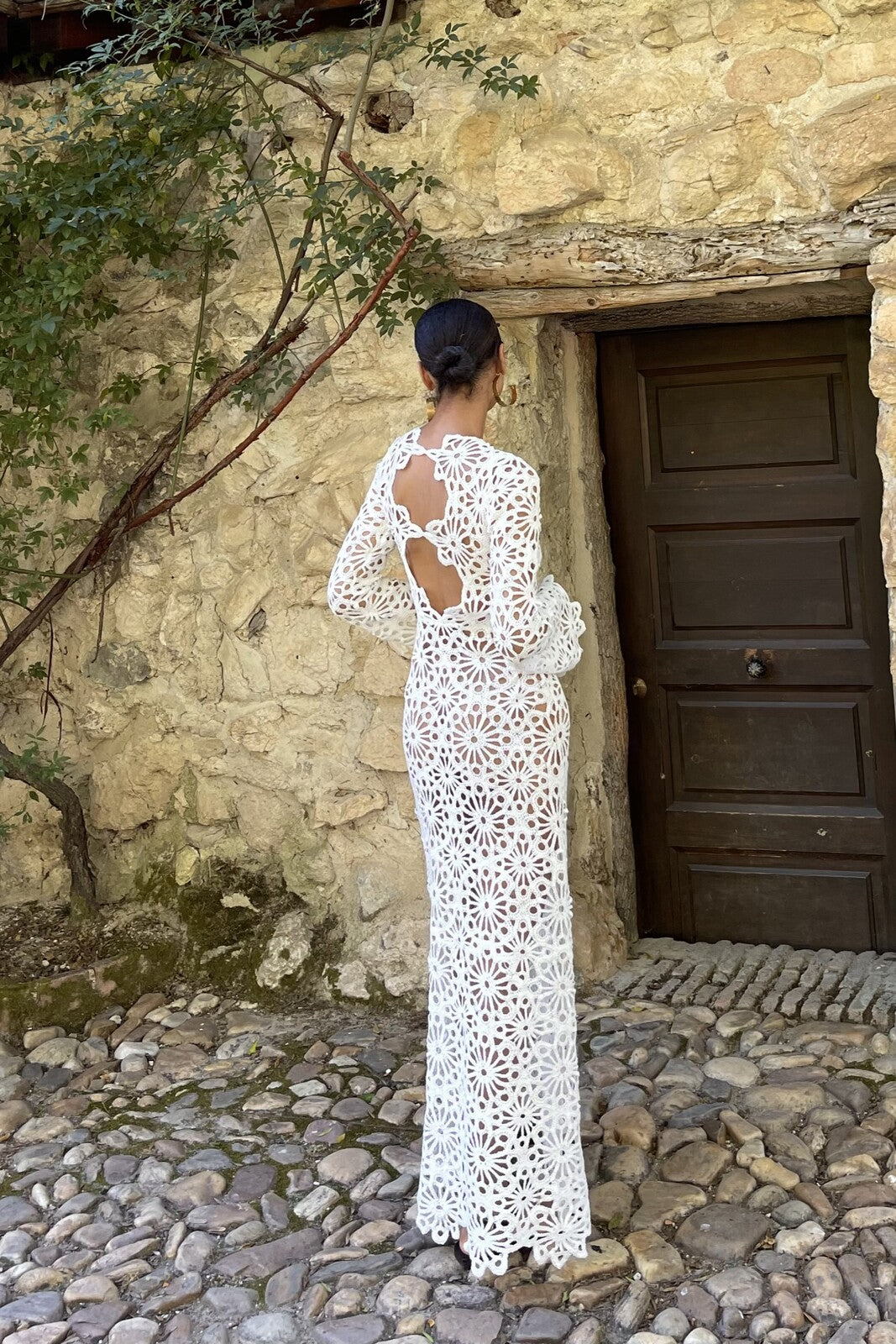 knit wedding dress Knitted Knitteria while soft knit drapery wraps the bodice and hips in sculptural folds that celebrate the female form Hand Knitted Lace Wedding Dress