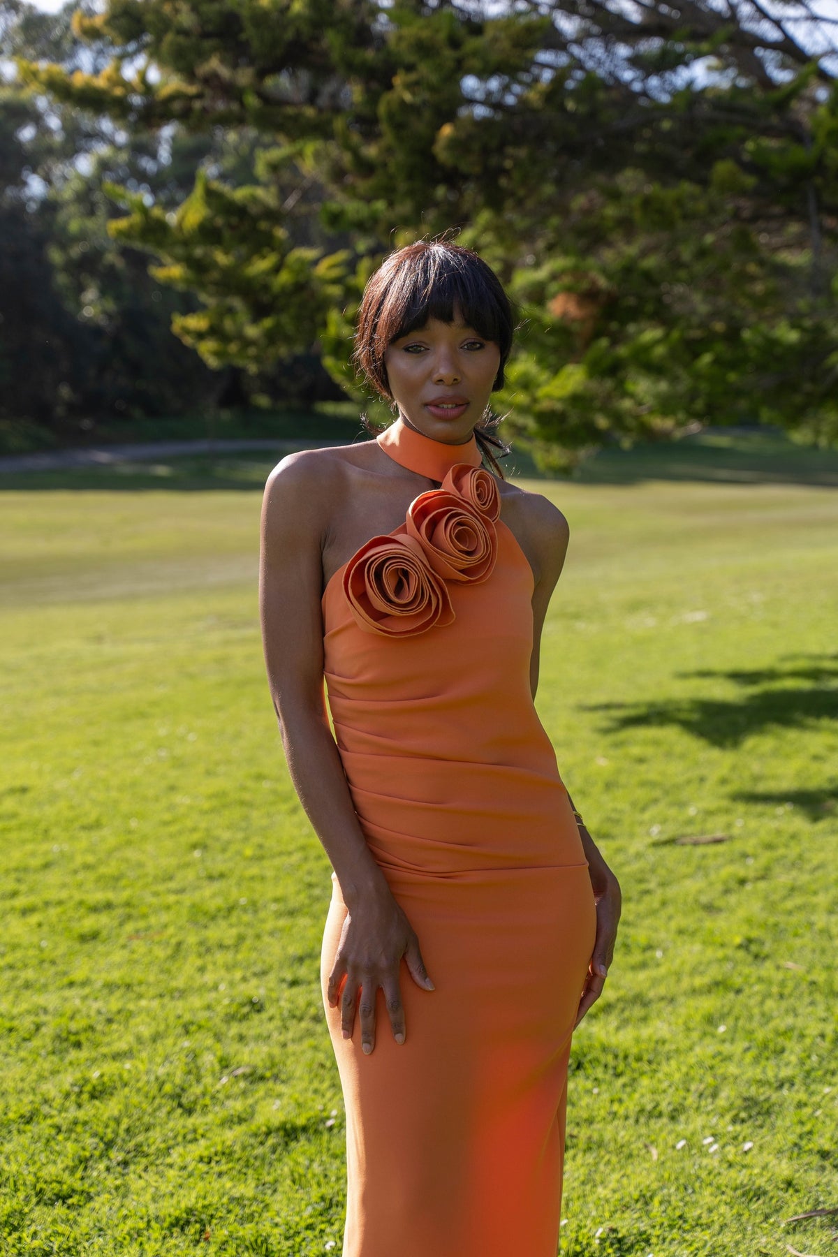 LONG ORANGE DRESS WITH FLOWER