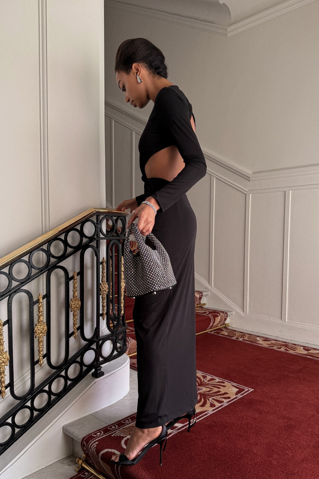 LONG BLACK DRESS WITH CUT-OUTS AND FRONT KNOT