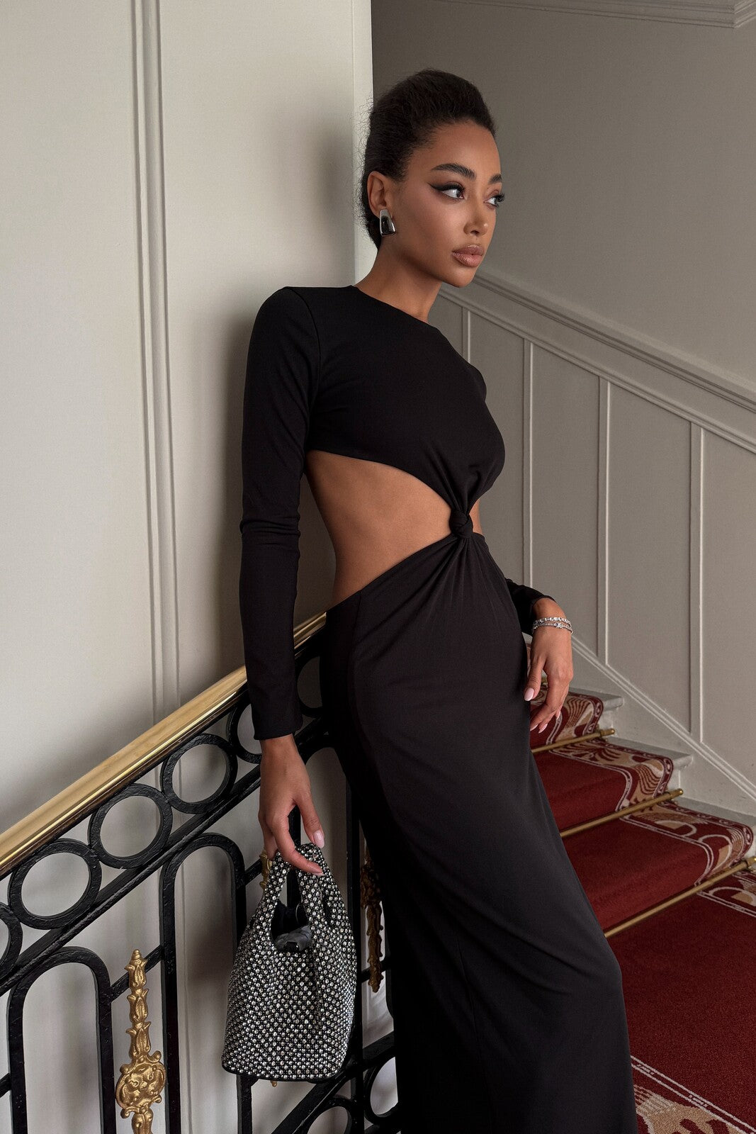 LONG BLACK DRESS WITH CUT-OUTS AND FRONT KNOT