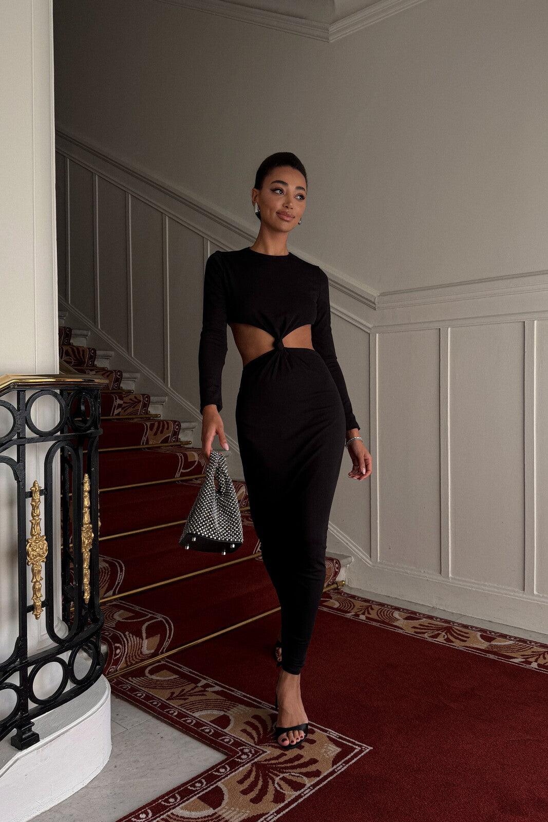 LONG BLACK DRESS WITH CUT-OUTS AND FRONT KNOT