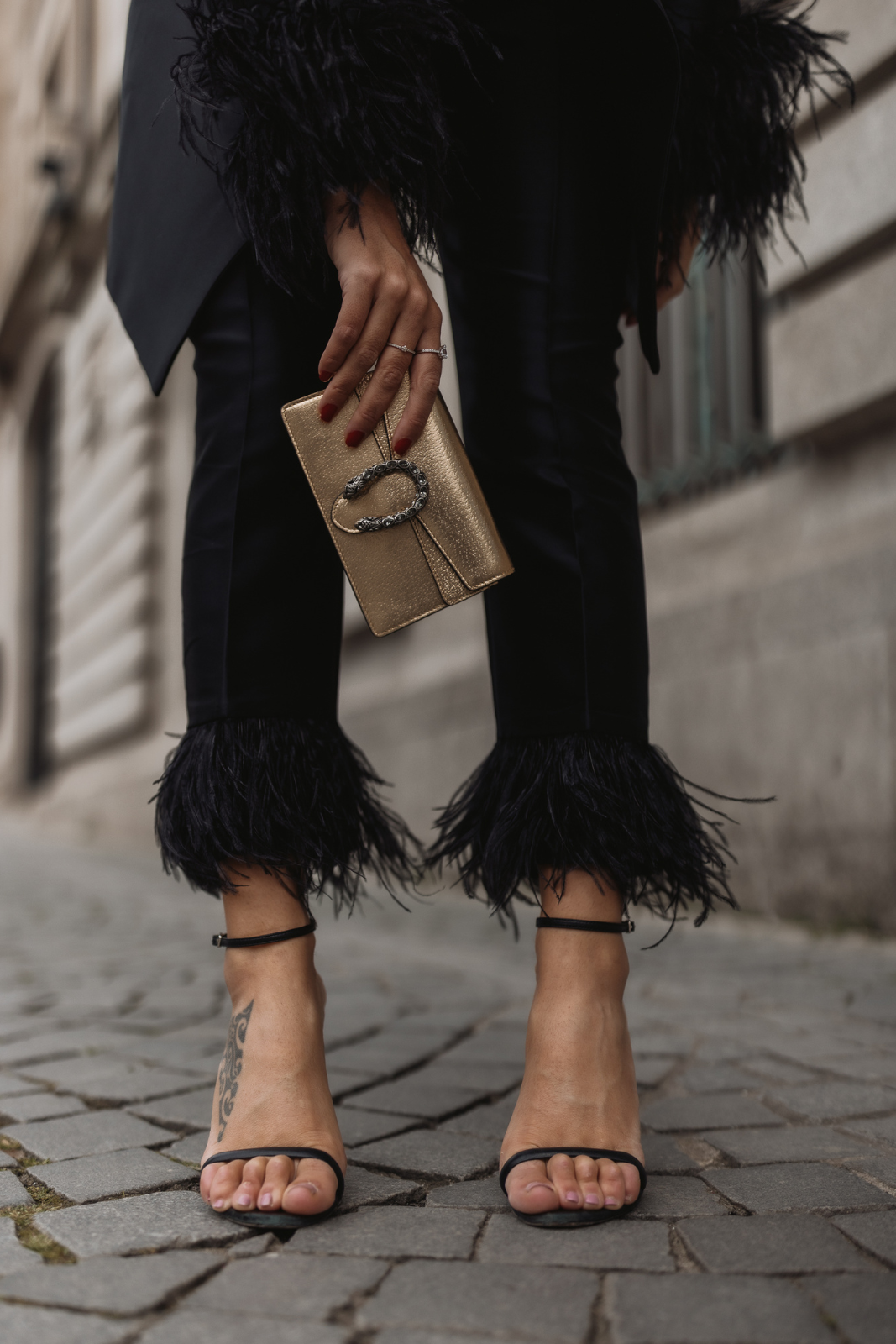 BLACK PANTS WITH FEATHERS
