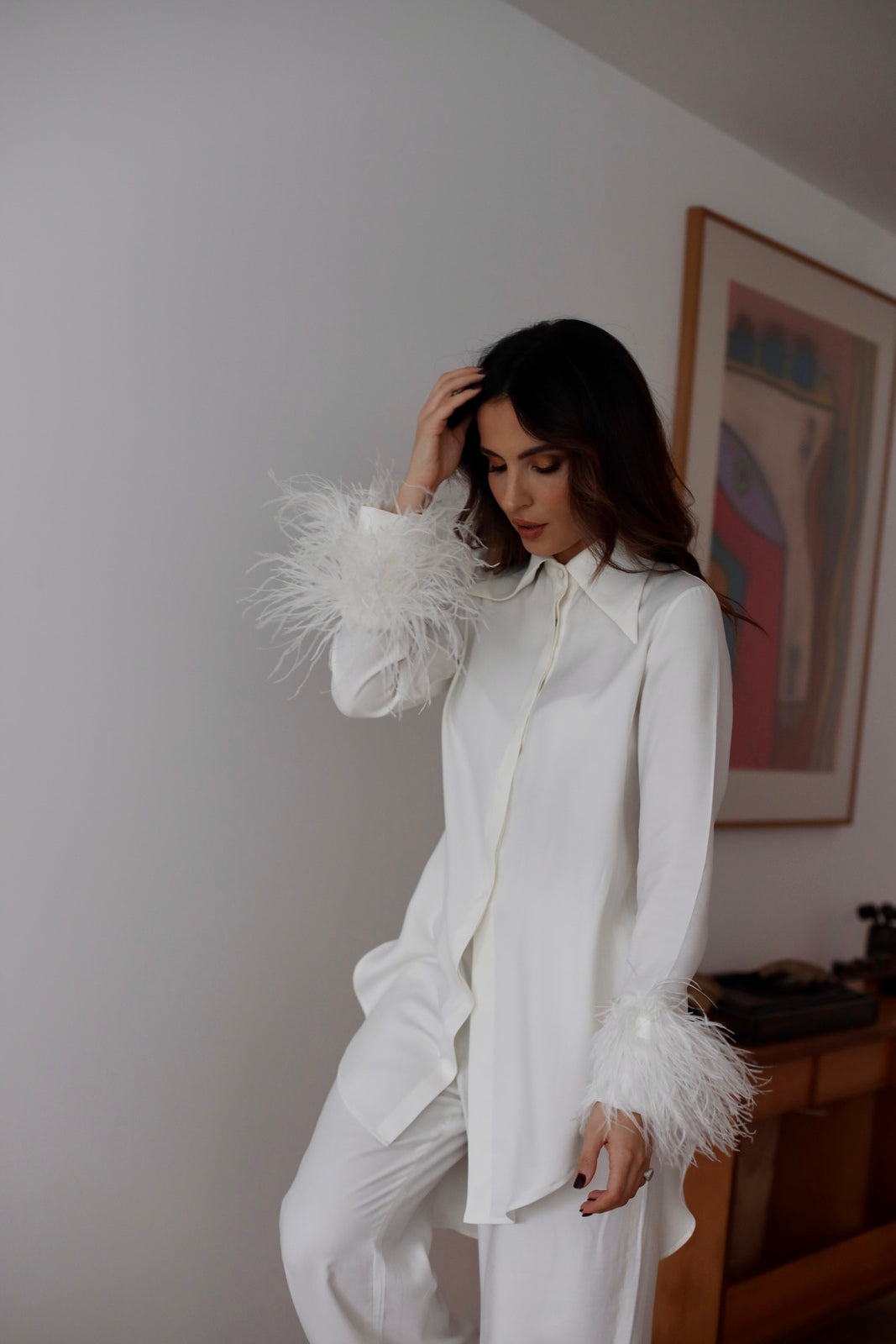 blusa blanca plumas